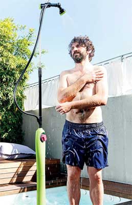 Outdoor Solar Heated Shower has Adjustable Height Post to 6 feet 9 inches Tall